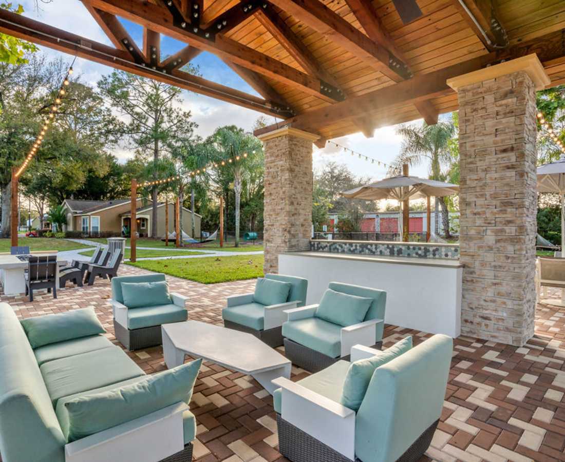 Outdoor seating area at The Canopy Apartment Villas in Orlando, Florida