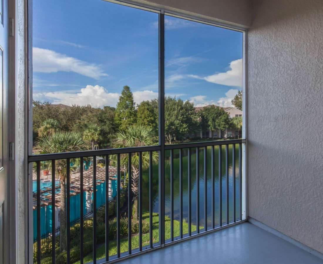 Attached patio with railing at The Legends At ChampionsGate in ChampionsGate, Florida