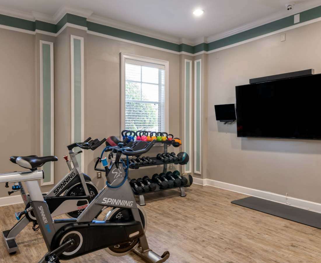 Fitness center with television at The Legends At ChampionsGate in ChampionsGate, Florida