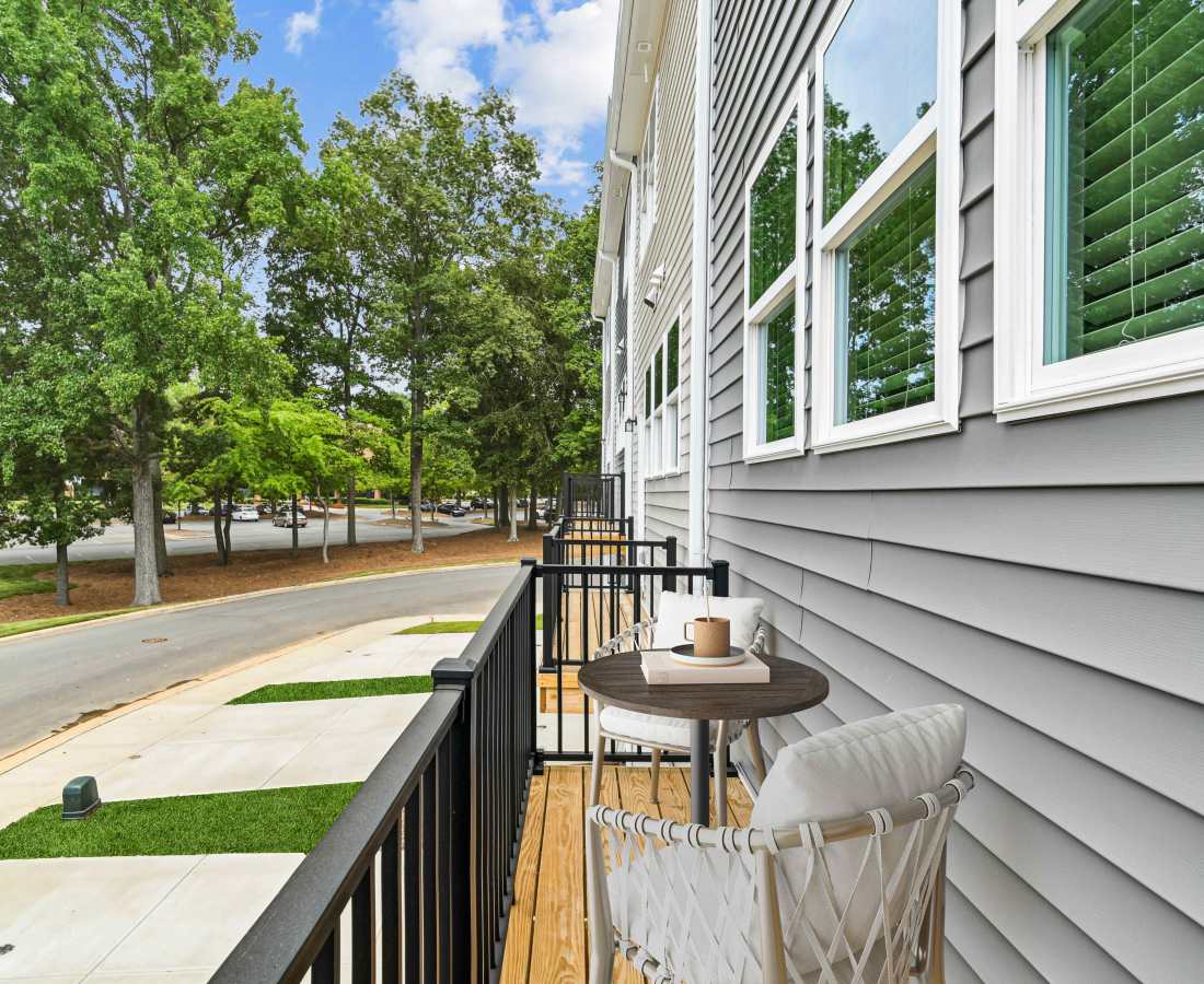 Balcony with chairs at Westmont Village in Charlotte, North Carolina