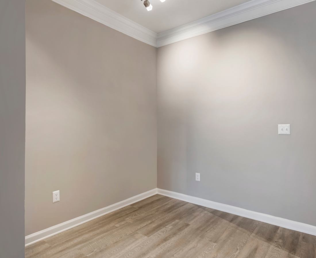 Unfurnished bedroom with wood-style flooring at The Legends At ChampionsGate in ChampionsGate, Florida