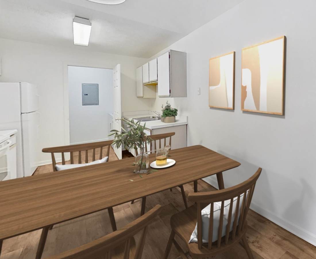 Modern decor in the dining area of a model home at Victoria Pointe Apartments in Jackson, Michigan