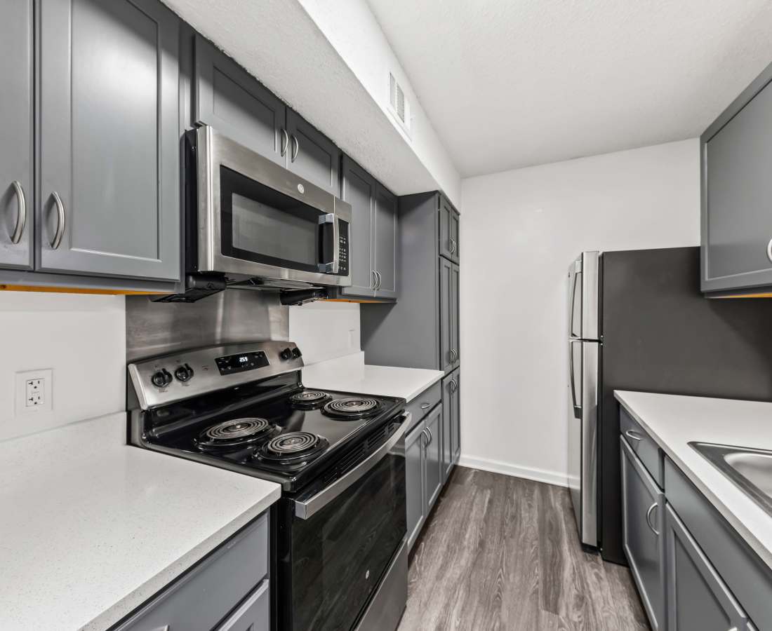 A kitchen with microwave oven and stove at Shannon Park in Goose Creek, South Carolina