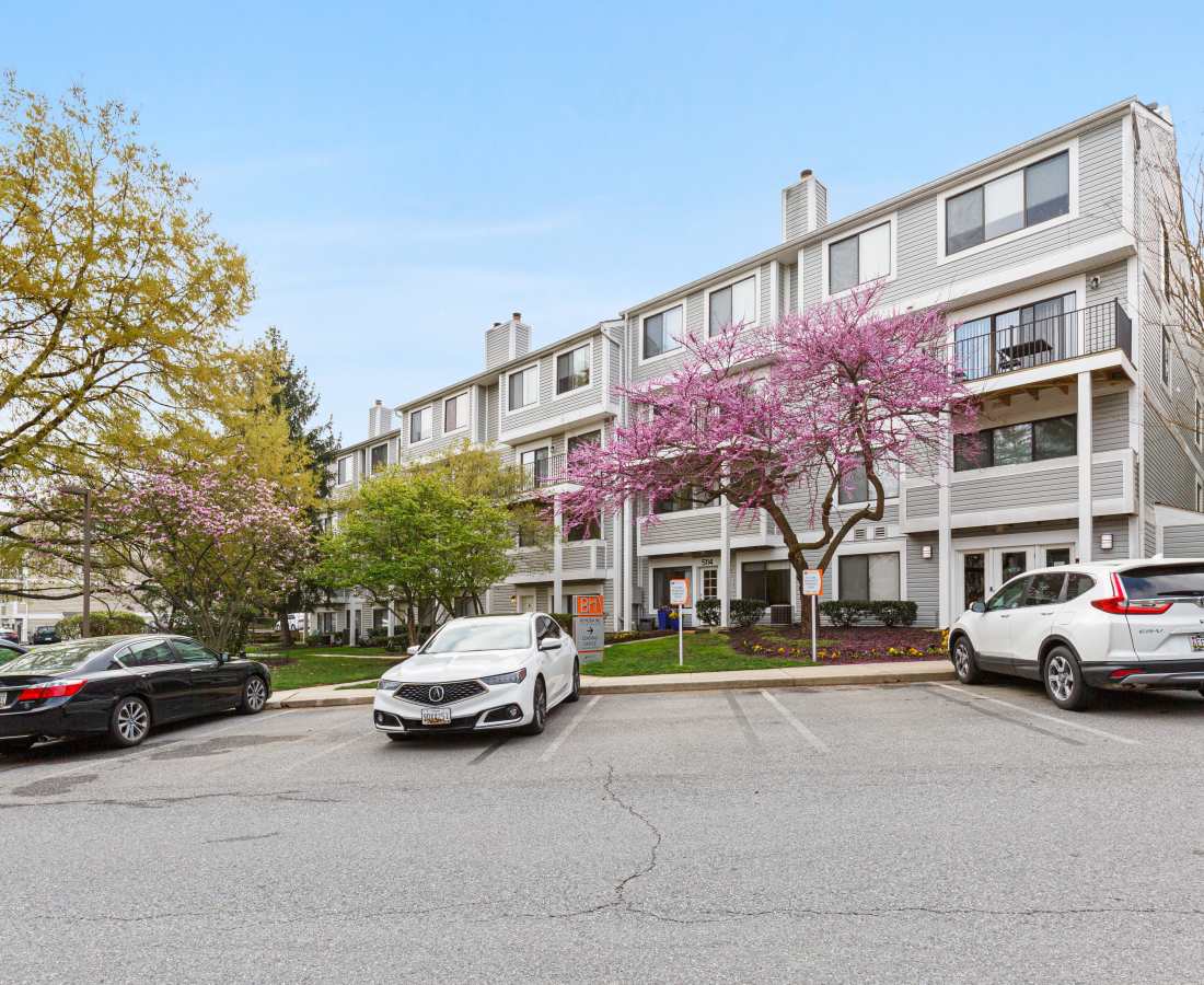 Cars parked in front of apartment building at Bethesda Hill in Bethesda, Maryland