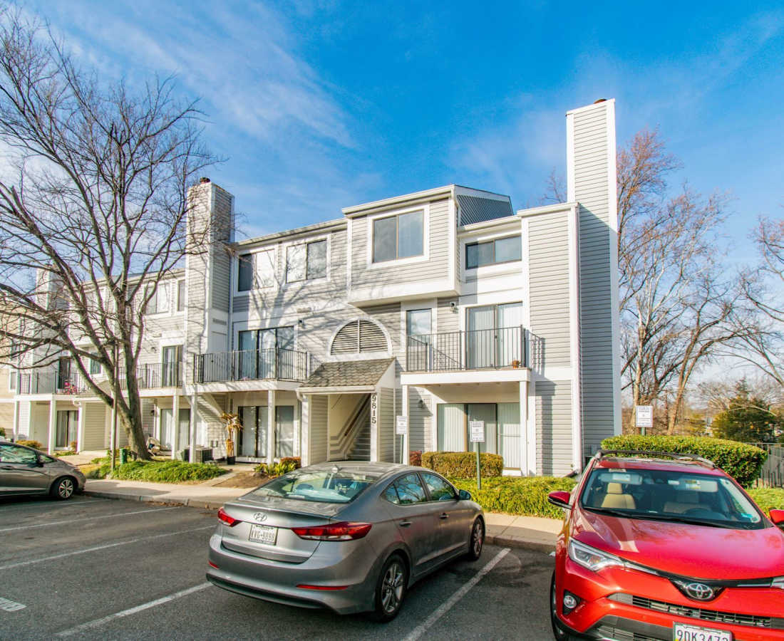 Gray apartment building with balconies at Bethesda Hill in Bethesda, Maryland