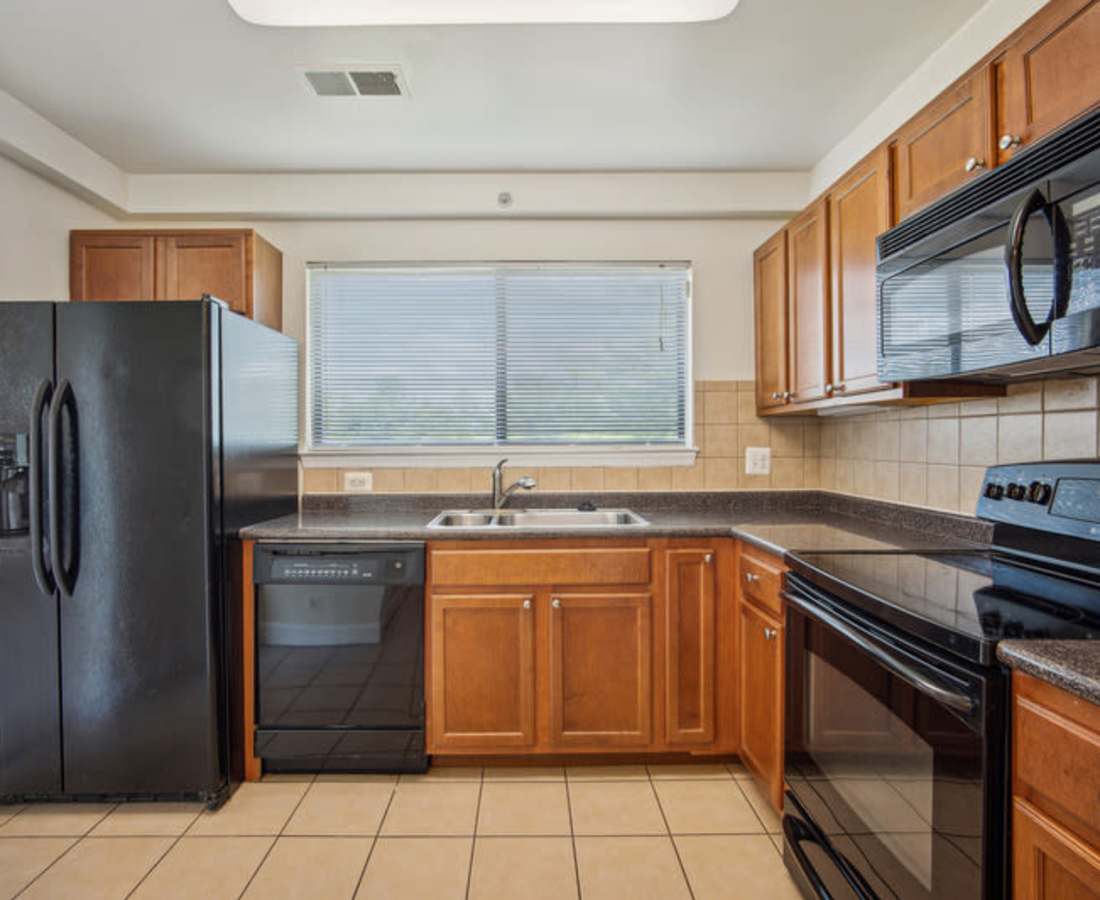 Window with blinds above kitchen sink at Bethesda Hill in Bethesda, Maryland