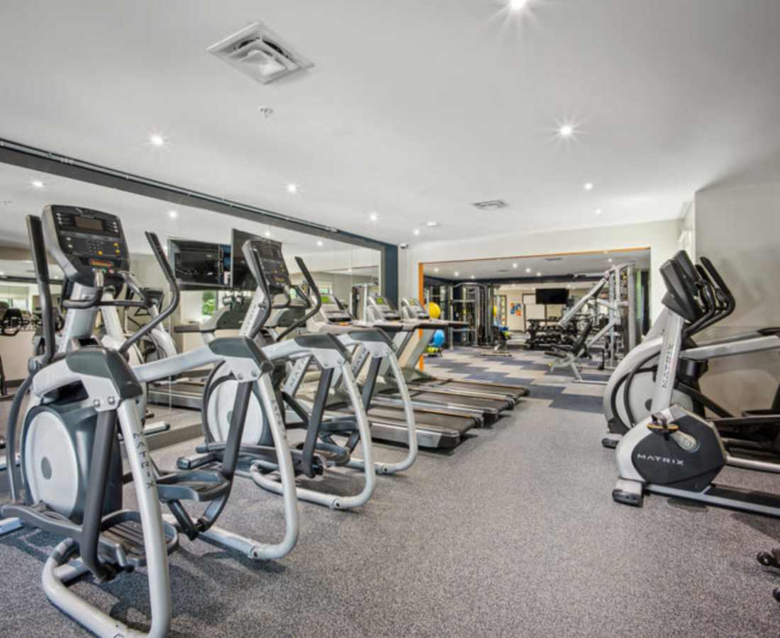 Fitness equipment in a gym area at Bethesda Hill in Bethesda, Maryland