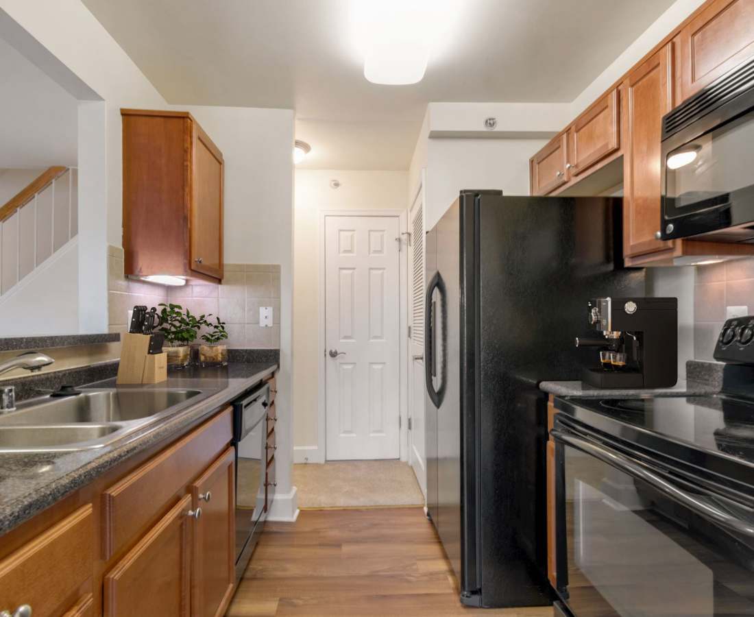 Wood cabinets and stainless steel appliances at Bethesda Hill in Bethesda, Maryland