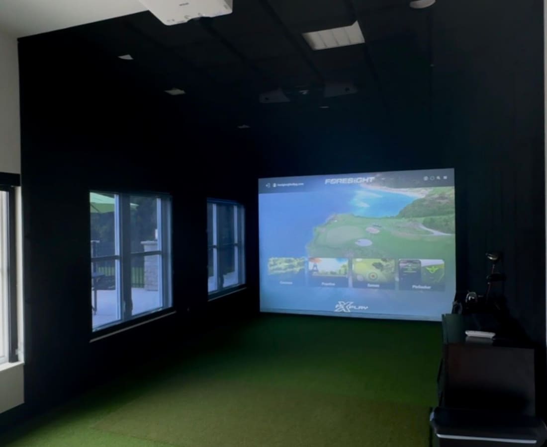 Community club with entertainment room at Pritchard Park Place in Racine, Wisconsin