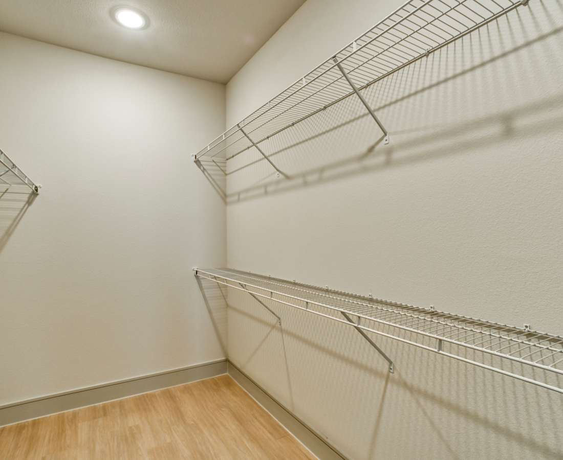 Wire shelving units on light wall at Dakota at Shepherd in Houston, Texas