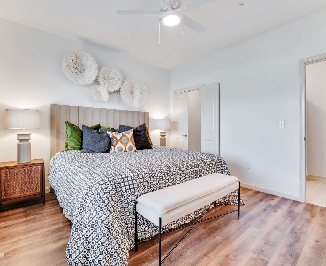 Spacious bedroom with stylish decor at Meridian City Park in Houston, Texas