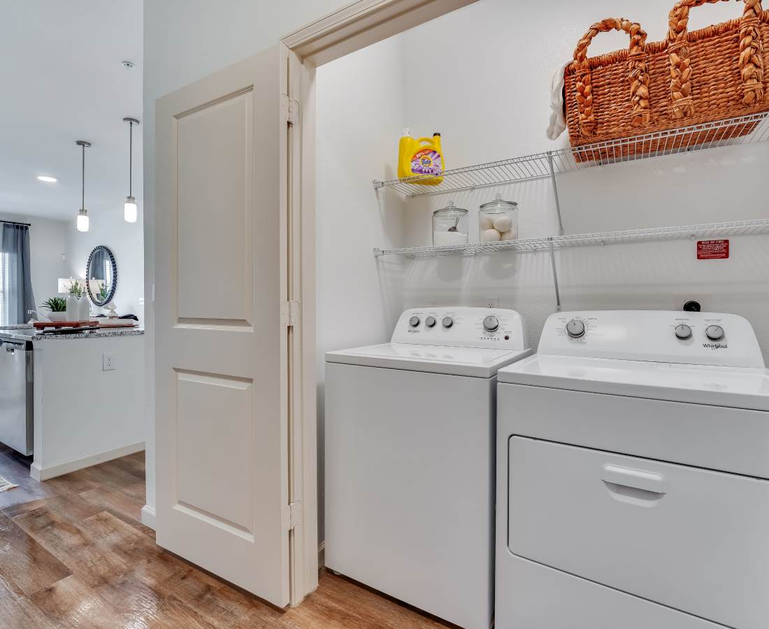 Laundry room with washer and dryer at Meridian City Park in Houston, Texas