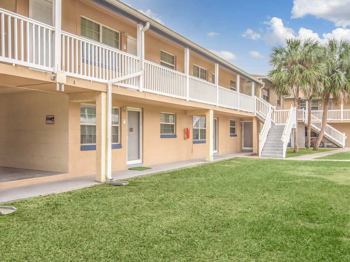 Apartment with lawn at Serenity Apartments in Leesburg, Florida