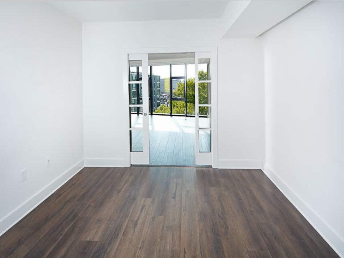 Wood-style flooring in an bright apartment at J Linea in Washington, District of Columbia