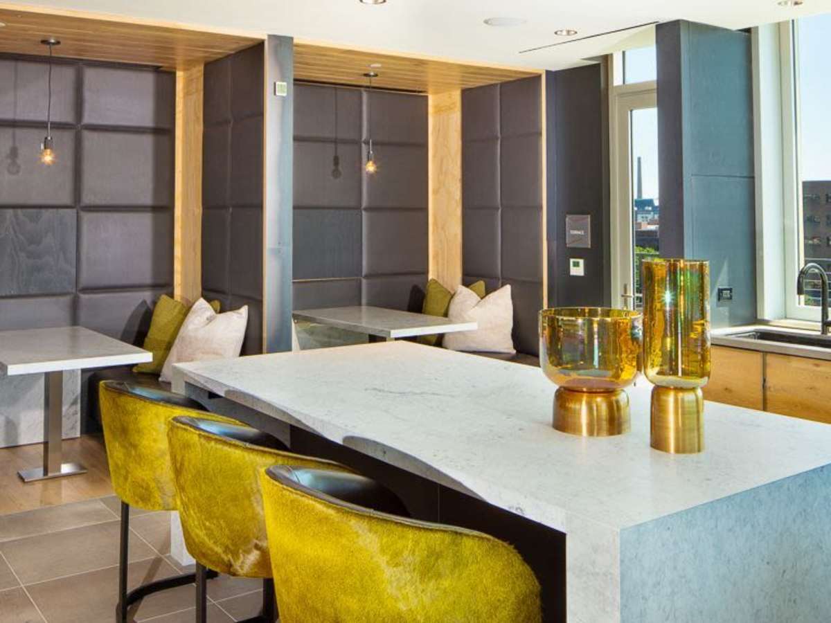 Coworking areas in the community clubhouse at J Linea in Washington, District of Columbia