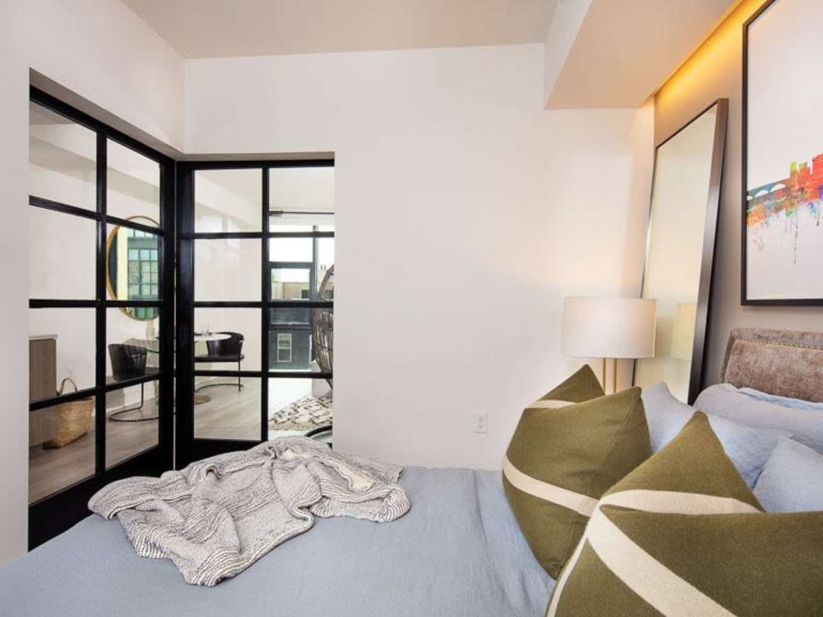 Bedroom area of an apartment at J Linea in Washington, District of Columbia