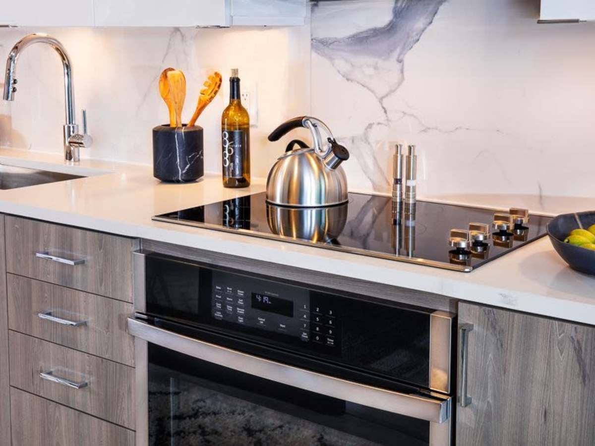 Kitchen with modern finishes at J Linea in Washington, District of Columbia