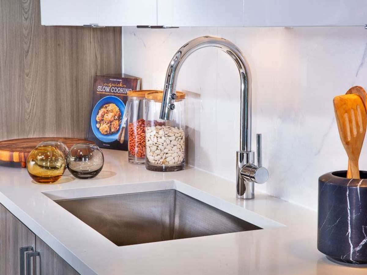 Stainless-steel faucet in an apartment kitchen at J Linea in Washington, District of Columbia