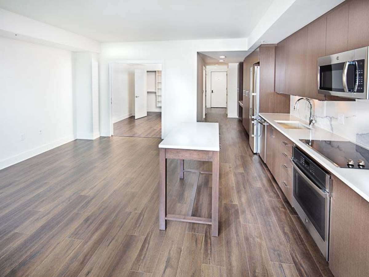 Kitchen with an island at J Linea in Washington, District of Columbia