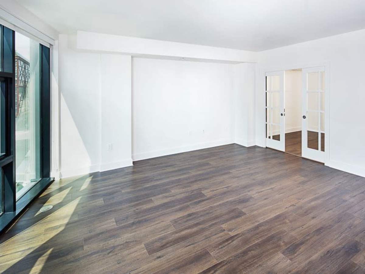 Wood-style flooring in an apartment living area at J Linea in Washington, District of Columbia