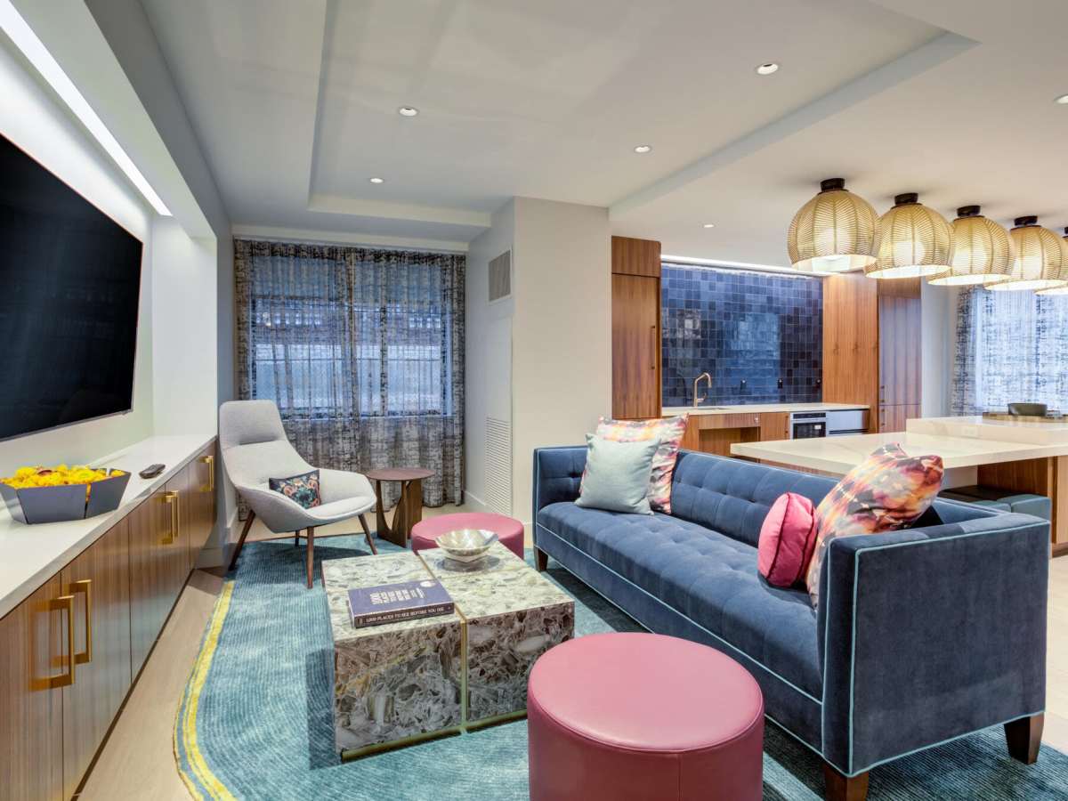 Seating around the TV in the clubhouse at J Vue at The LMA in Boston, Massachusetts