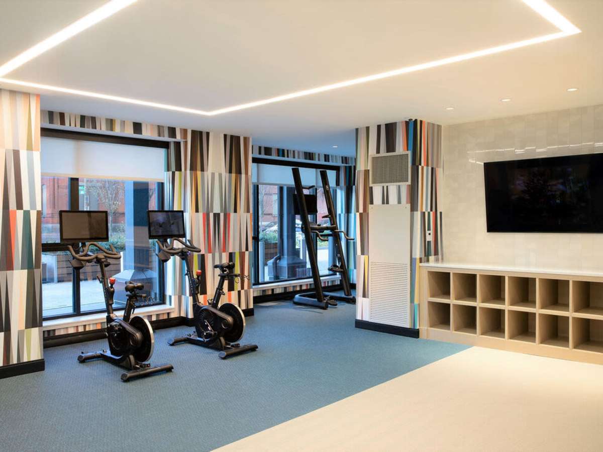 24-hour fitness center with cardio equipment at J Vue at The LMA in Boston, Massachusetts