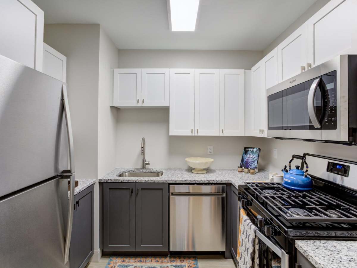 Stainless-steel appliances in an apartment kitchen at J Vue at The LMA in Boston, Massachusetts