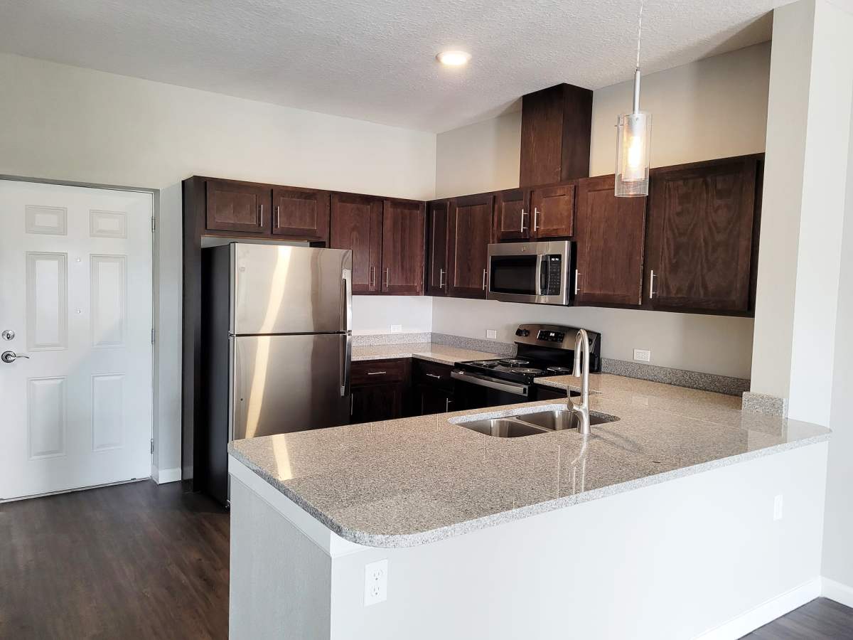 Kitchen with granite countertop at Seacoast Apartments in St Marys, Georgia