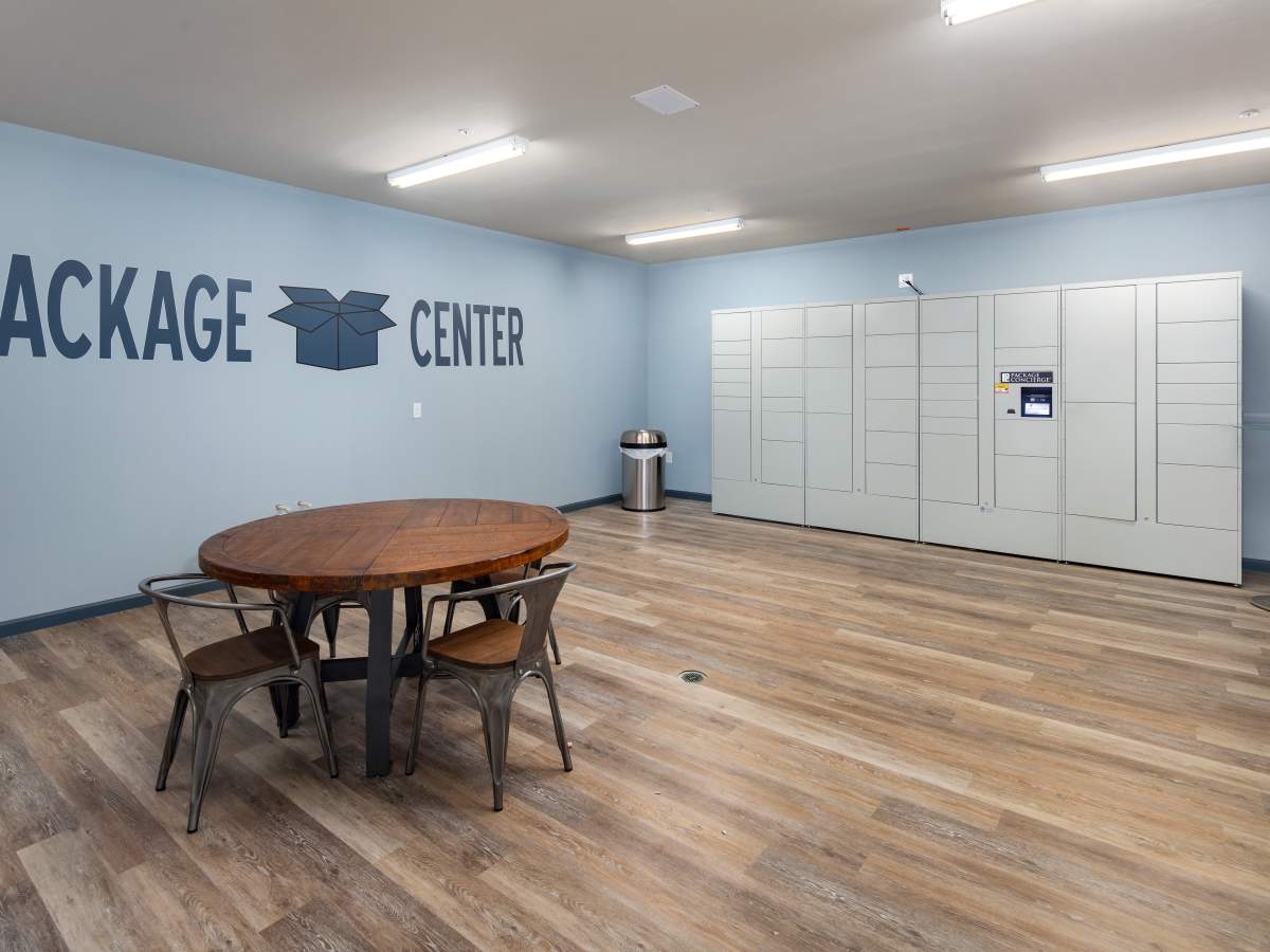 Modern table and chairs in package center at Ardmore & Twenty Eighth in Atlanta, Georgia