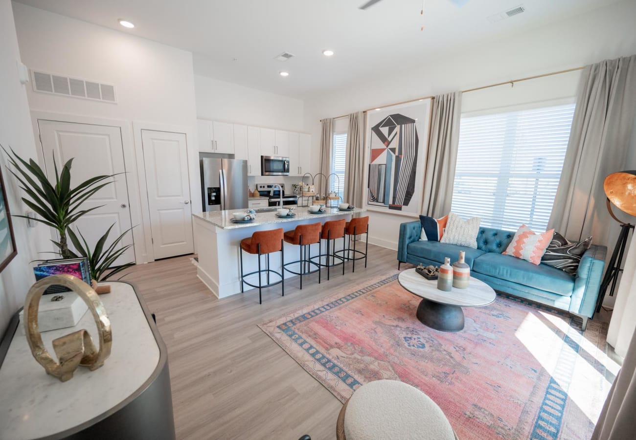 Spacious apartment with wood flooring and large windows at The Enzo at Ariston in Buford, Georgia