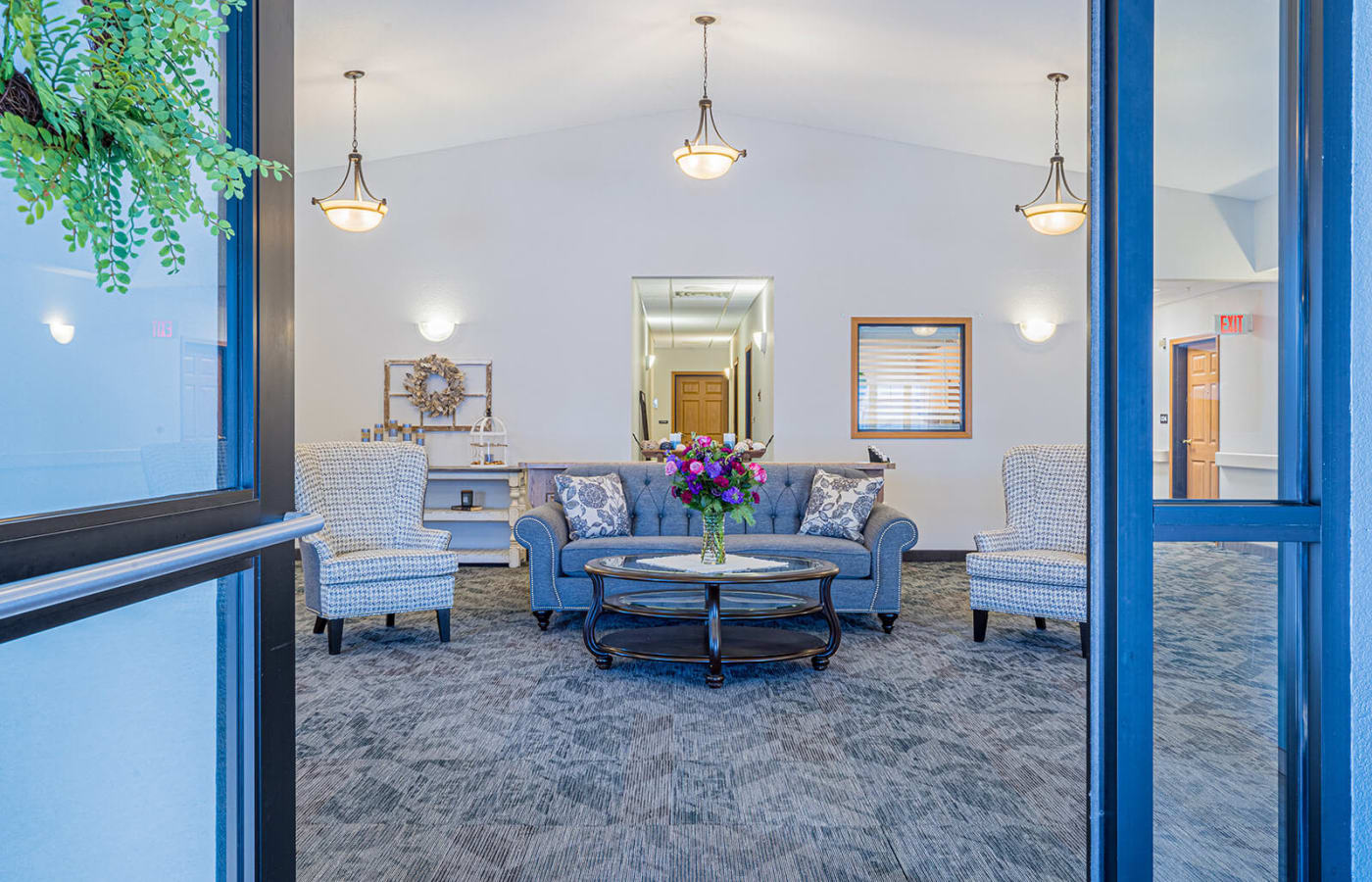 Bright and spacious lobby at Traditions of Owatonna in Owatonna, Minnesota