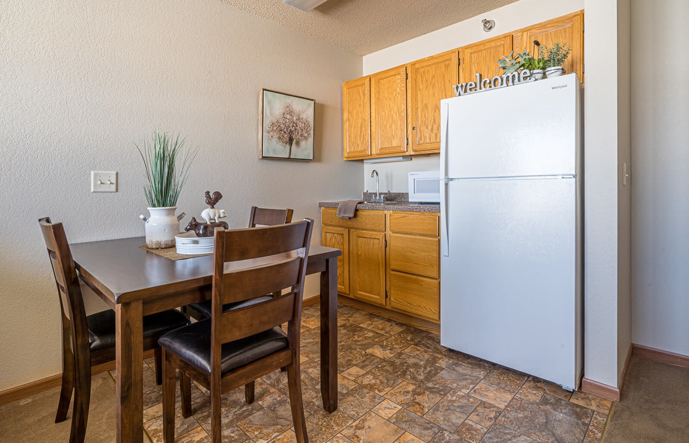 Resident apartment with kitchenette at Traditions of Owatonna in Owatonna, Minnesota