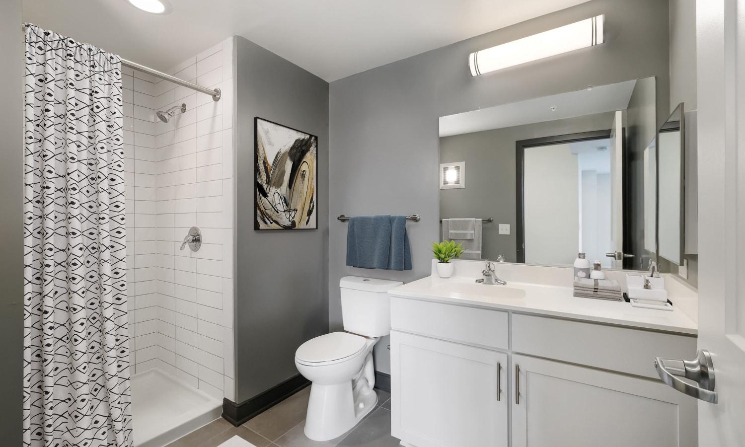 Spacious Bathrooms with Subway Tiles at Liberty Place Apartments