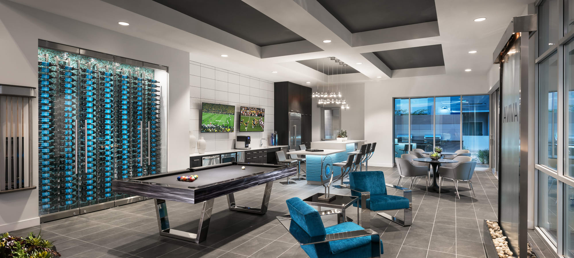Clubhouse pool table and indoor waterfall at Aviva in Mesa, Arizona