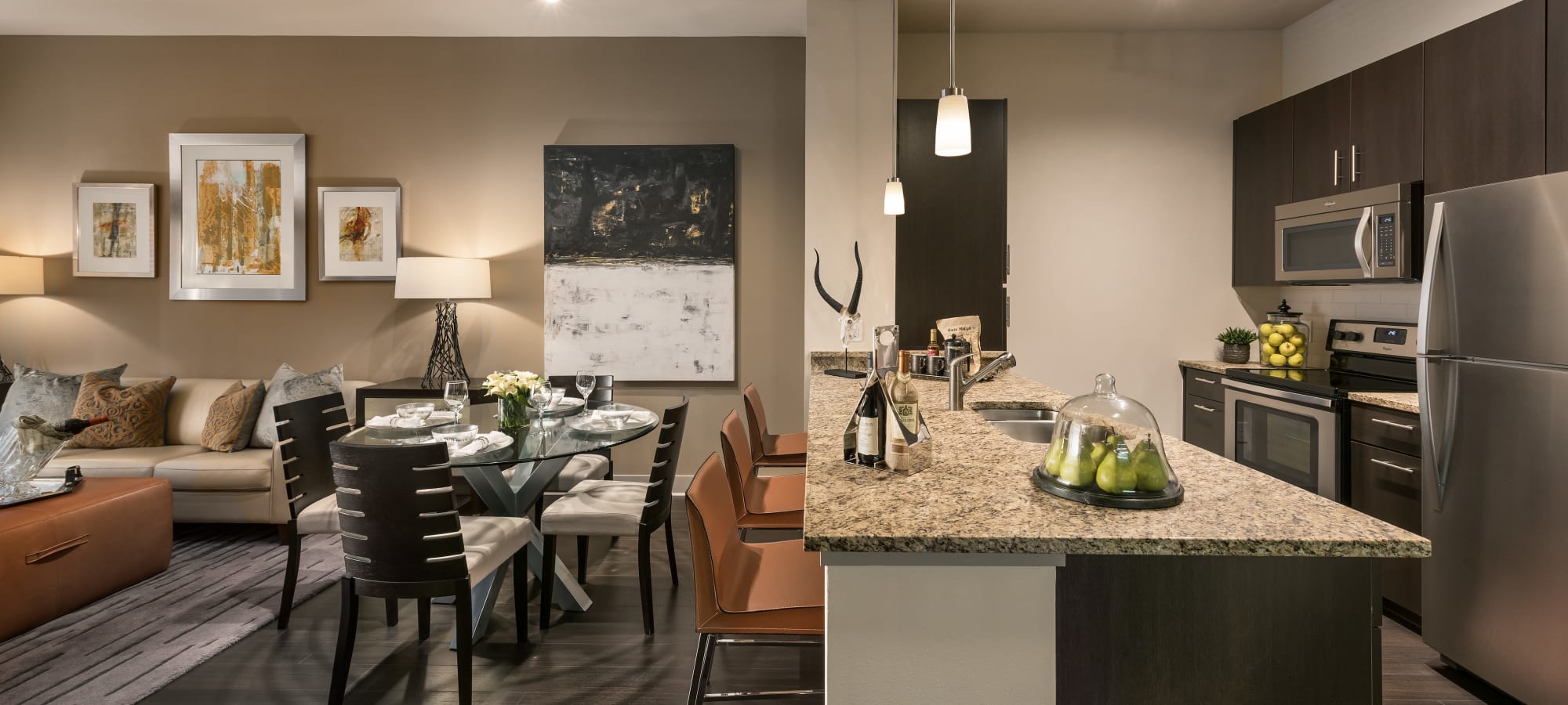 Open kitchen with breakfast bar at Emerson Mill Avenue in Tempe, Arizona