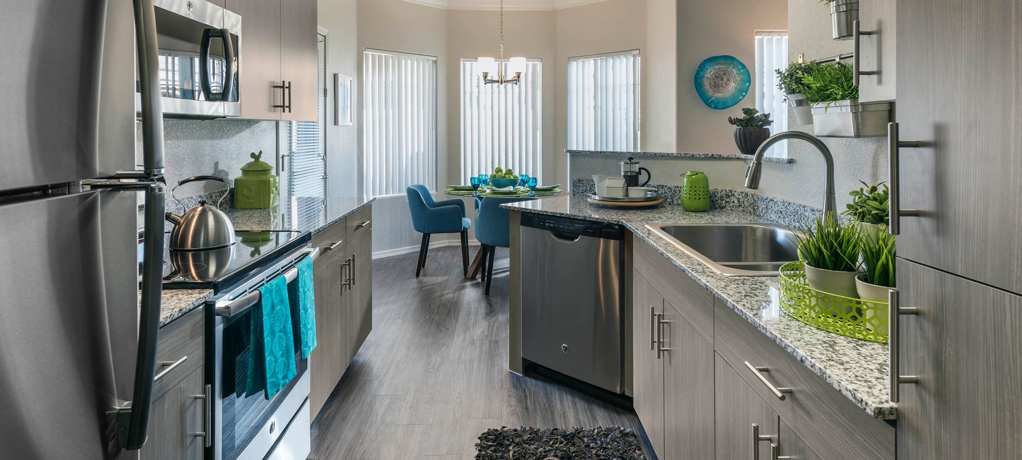 Stainless-steel appliances in the kitchen of a model home at Mira Santi in Chandler, Arizona
