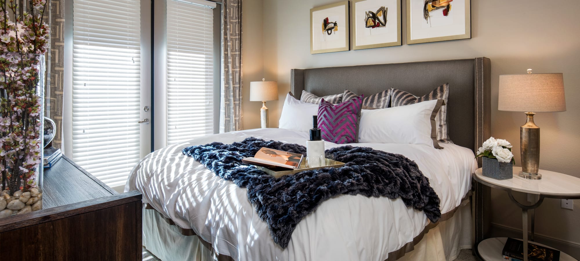 Bedroom with plush carpeting in a model home at The Core Scottsdale in Scottsdale, Arizona