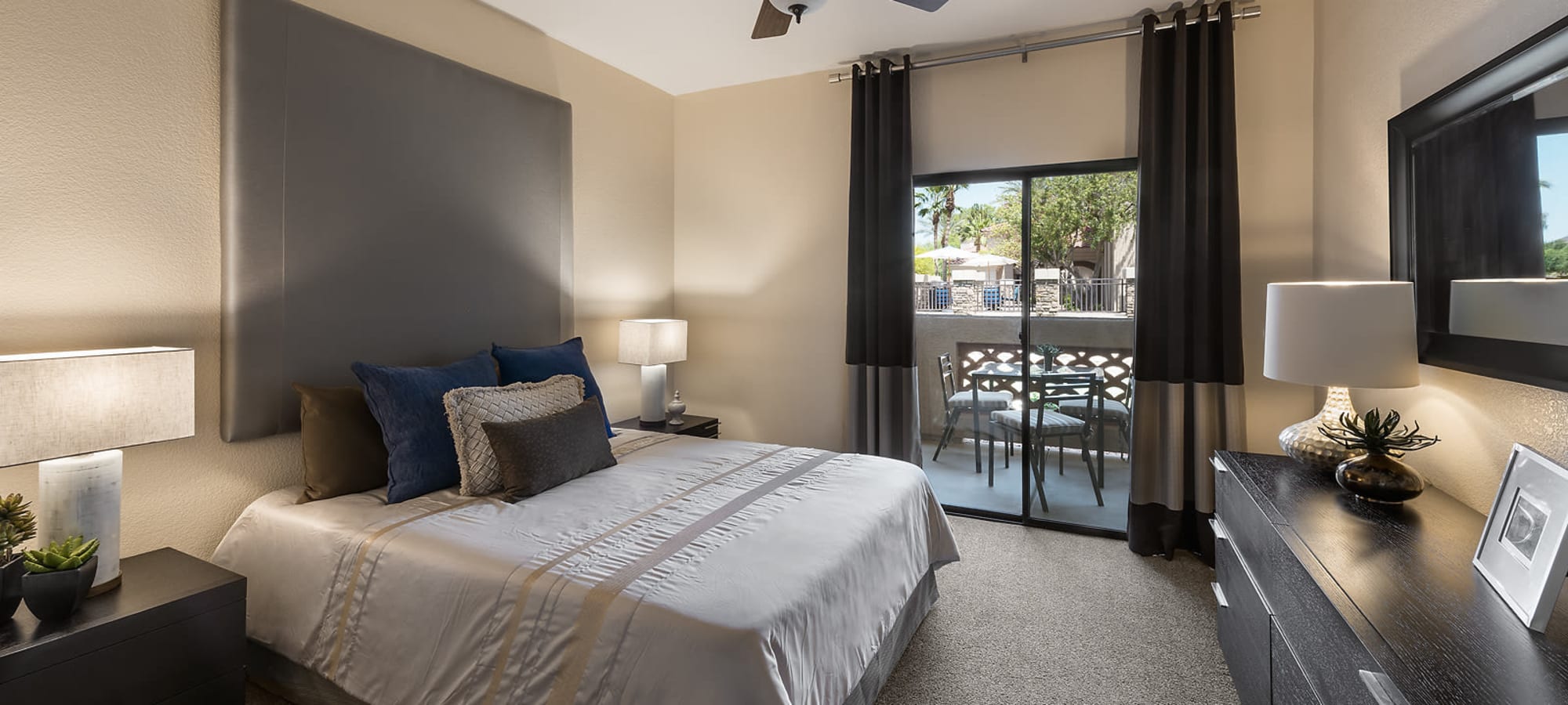 Bedroom with patio access at San Lagos in Glendale, Arizona