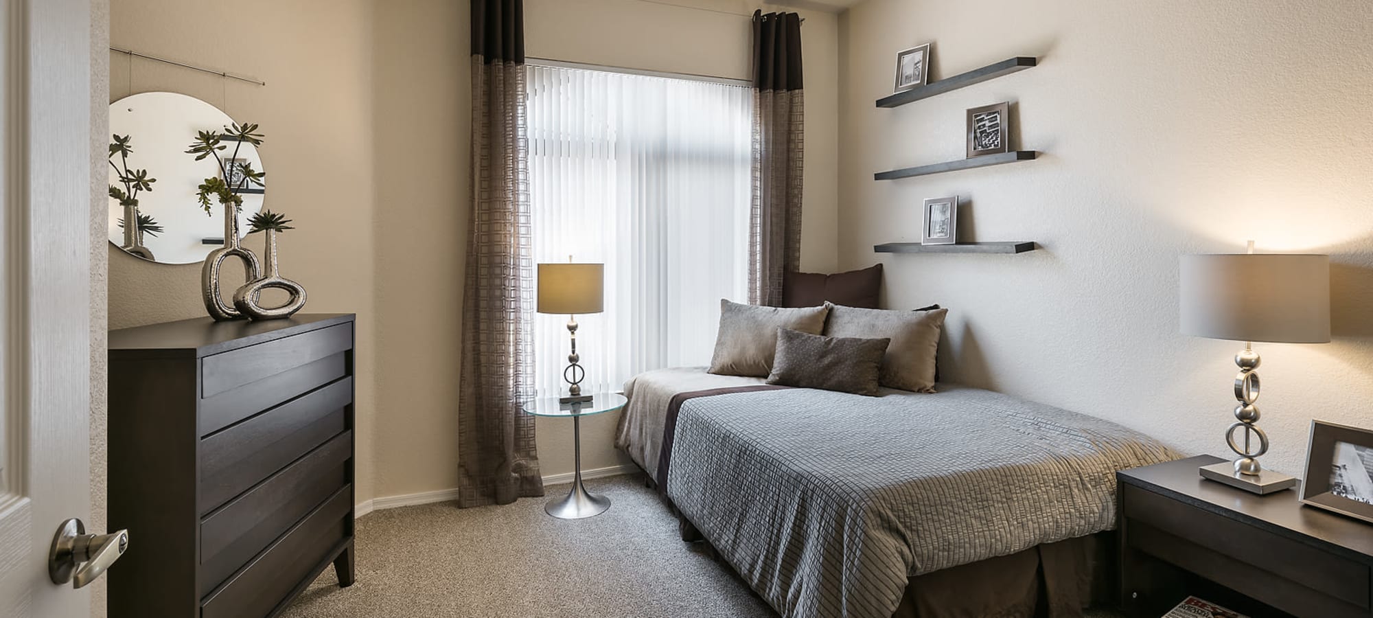 Guest bedroom with furniture at San Lagos in Glendale, Arizona