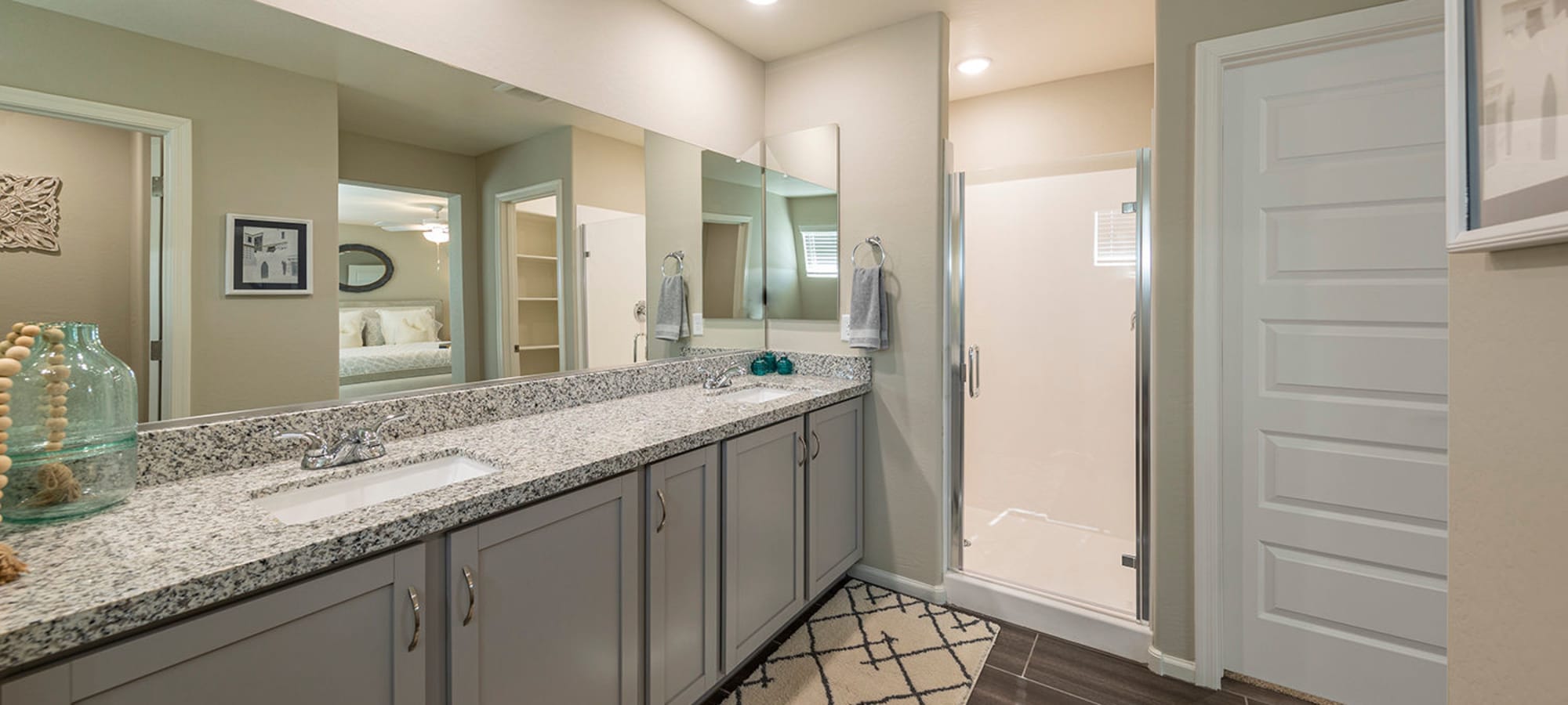 Luxury bathroom with white cabinets at BB Living at Val Vista in Gilbert, Arizona