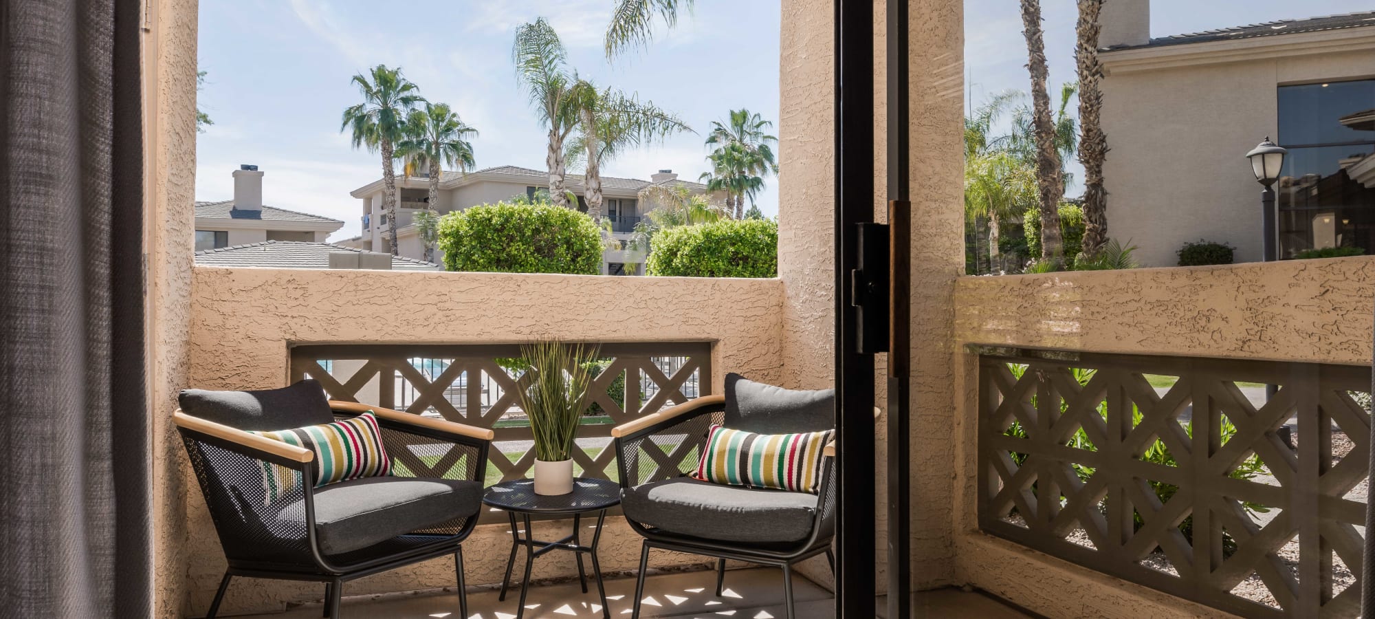 Private patio with some cute chairs to relax on and enjoy the nice view at Elite North Scottsdale in Scottsdale, Arizona