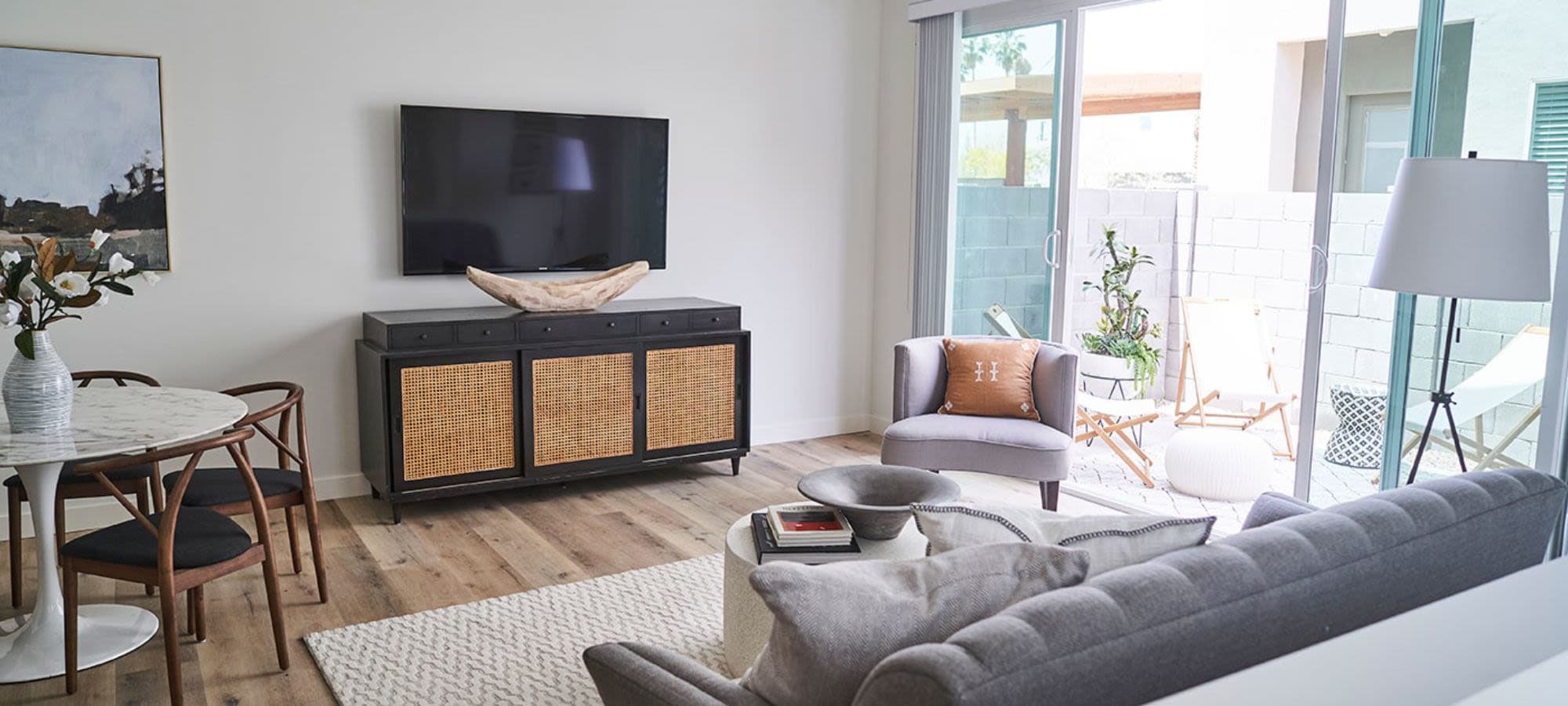 Modern living room with tv at Novella at Biltmore in Phoenix, Arizona