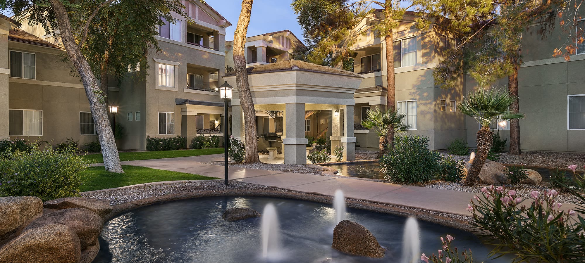 Beautiful outdoor walkway with fountain and gazebo at The Reserve at Gilbert Towne Centre in Gilbert, Arizona