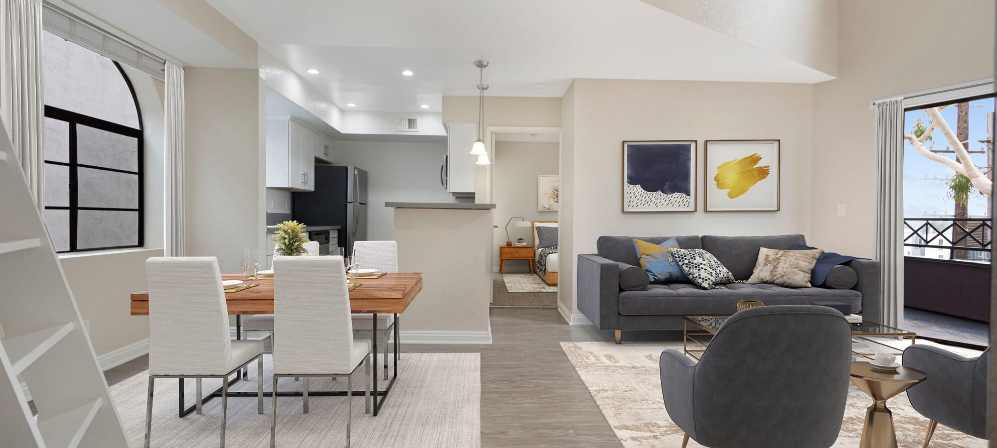 Model living space with gray accents at The Jeremy in Los Angeles, California