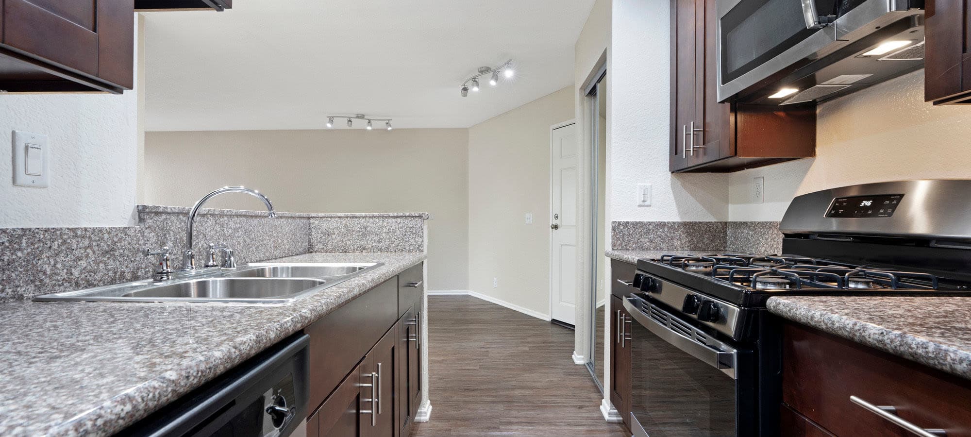 Model kitchen with wood accents at The Jeremy in Los Angeles, California