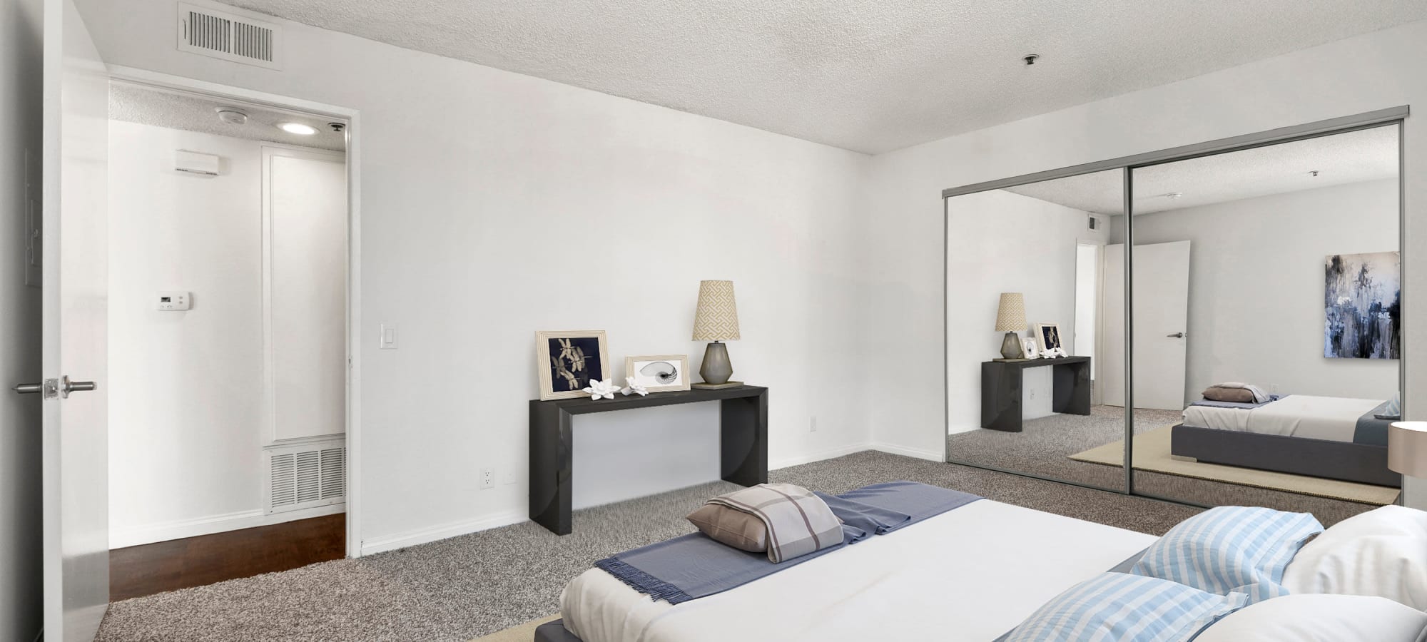 Well decorated model bedroom at The Jessica Apartments, Los Angeles, California