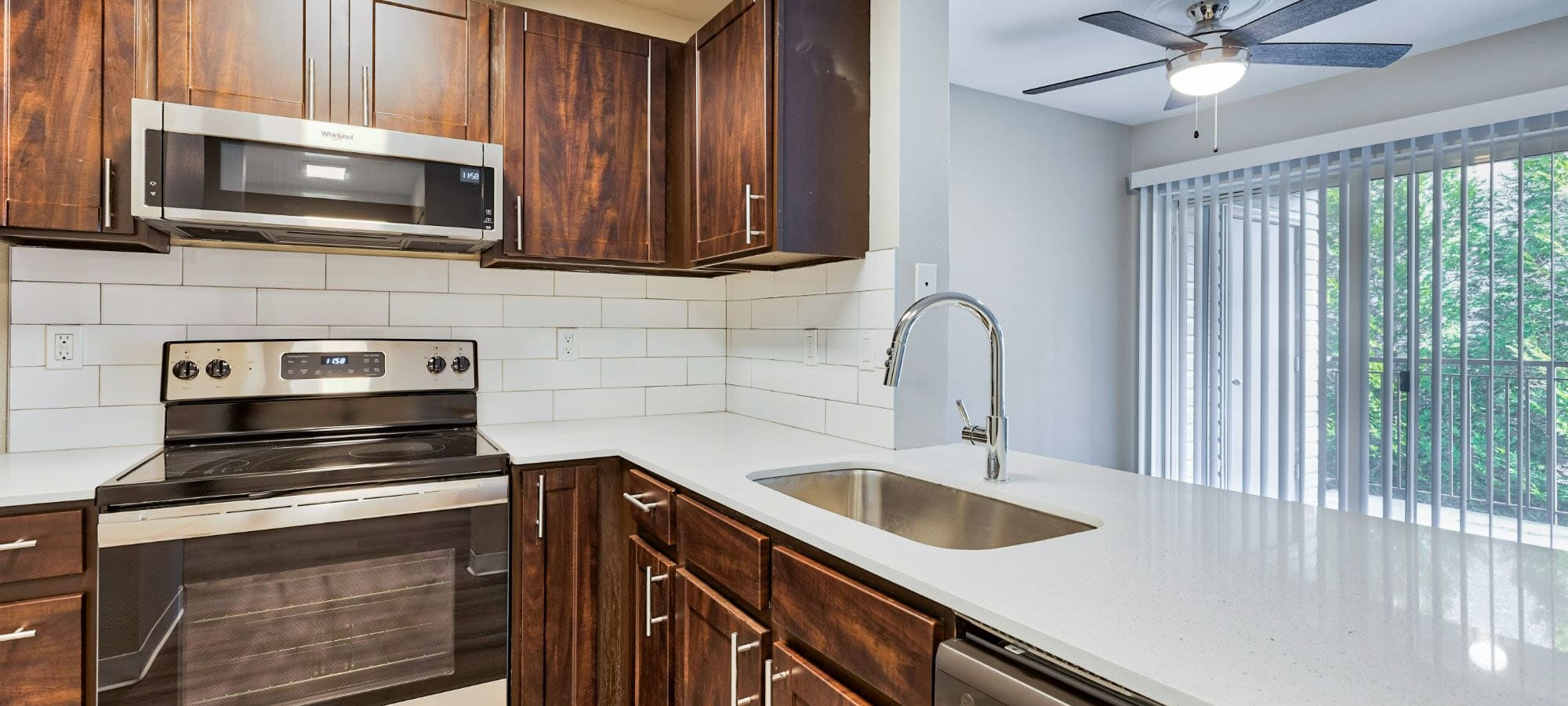 Kitchen with brown cabinet at The Retreat at Bothell, Bothell, Washington