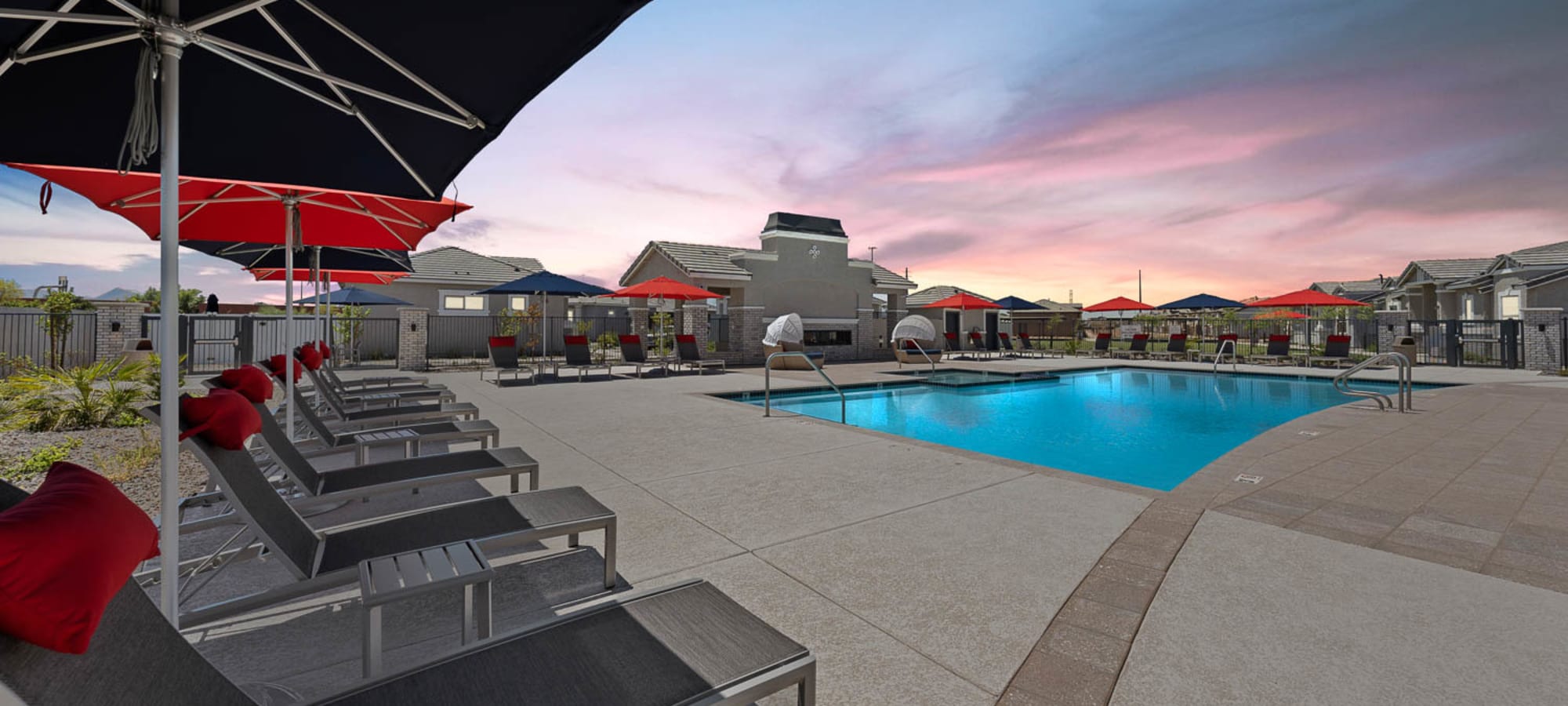 Sunset over pool area at Cottages at McDowell in Avondale, Arizona