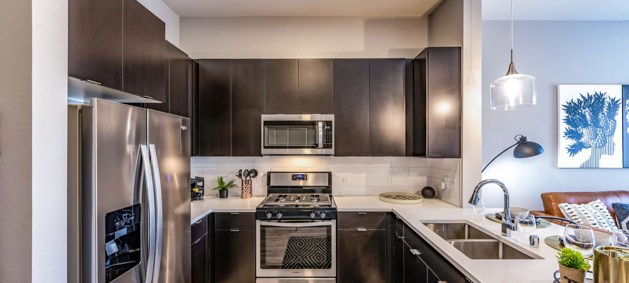 Stainless-steel energy-efficient appliances in a model apartment's kitchen at Jade Apartments in Las Vegas, Nevada