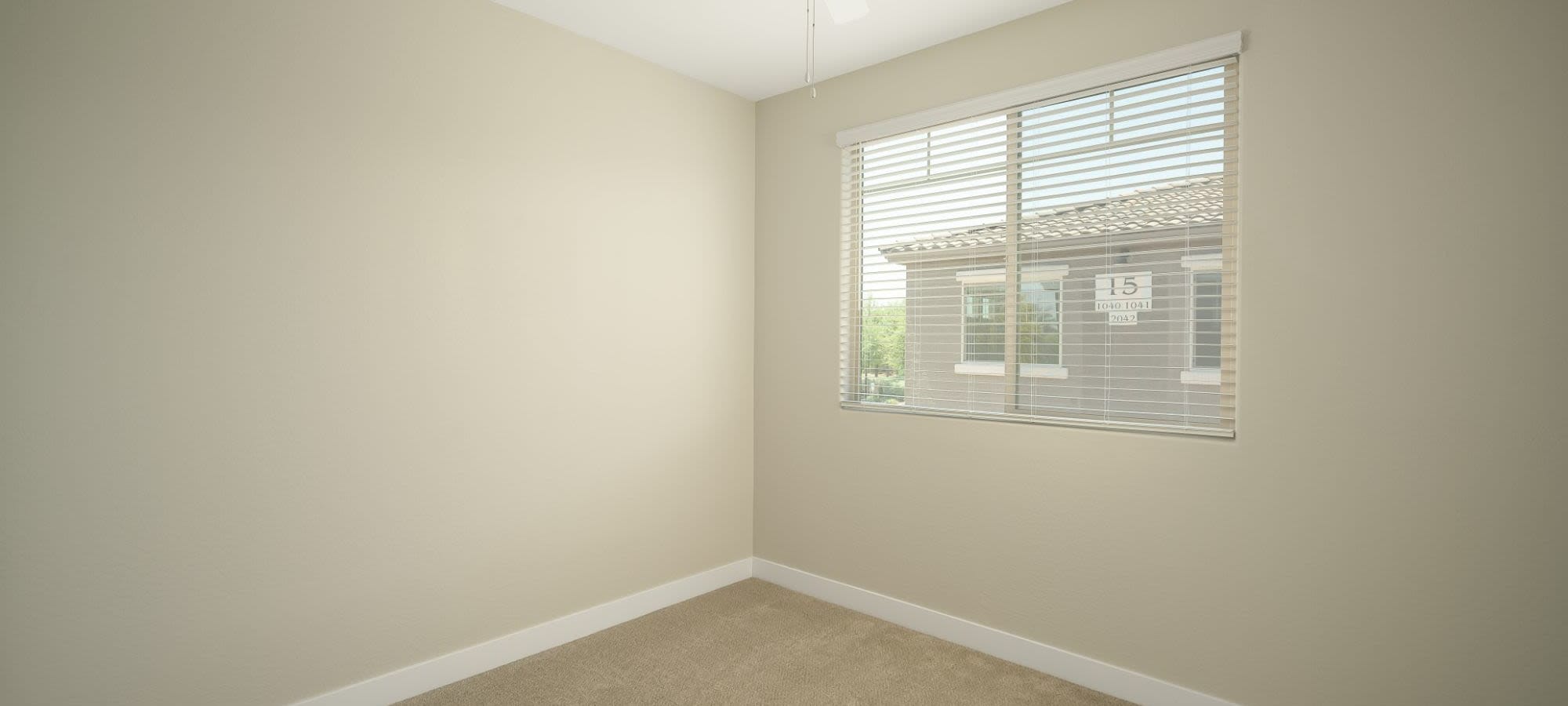 Bedroom with nice carpet at Sierra Verde in Surprise, Arizona